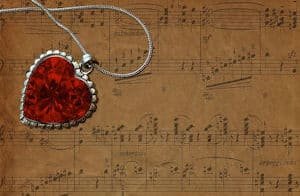 Soul Friend: sheet music and a heart necklace