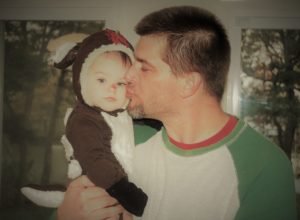 a dad and daughter dressed as a deer on Halloween