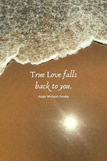 love quote with a sun reflection on the beach...
